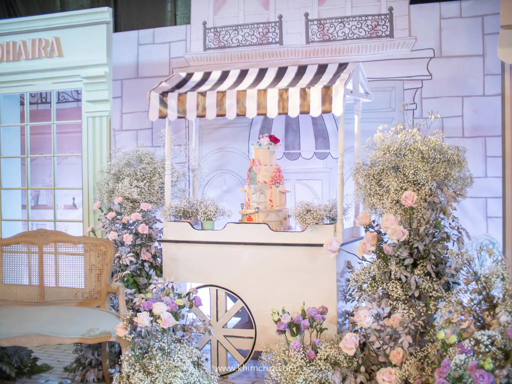 dainty patisserie theme birthday cake on food cart