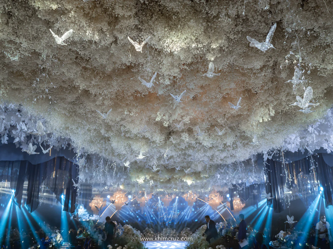 48 feet Gypsophilas hanged with crystals and birds as ceiling installation at a dreamy blue ethereal wedding