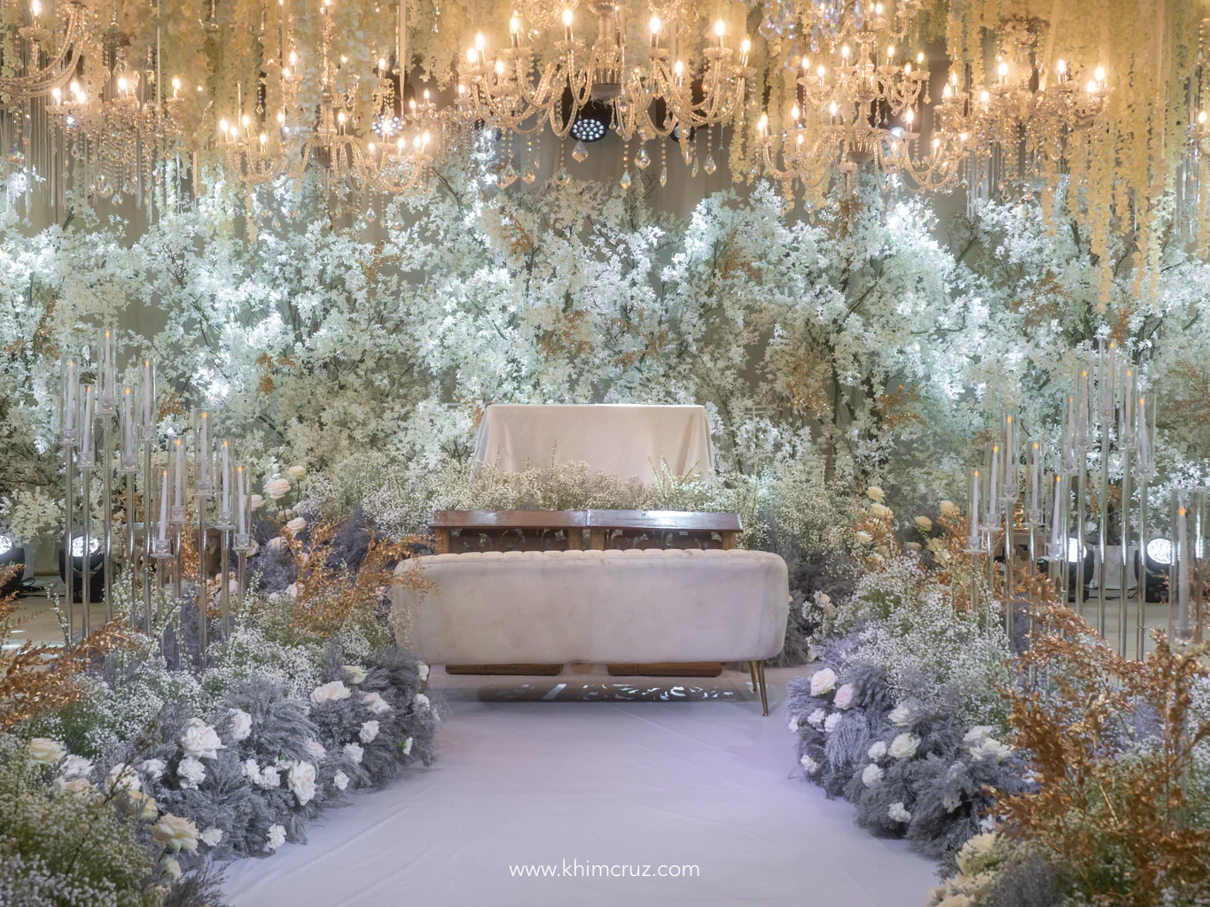 all white wedding ceremony with gold accents for a 50th golden wedding anniversary