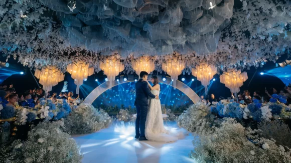 dreamy ethereal wedding with bride and groom couple dancing on the dance floor with gradient floral arrangement by Khim Cruz