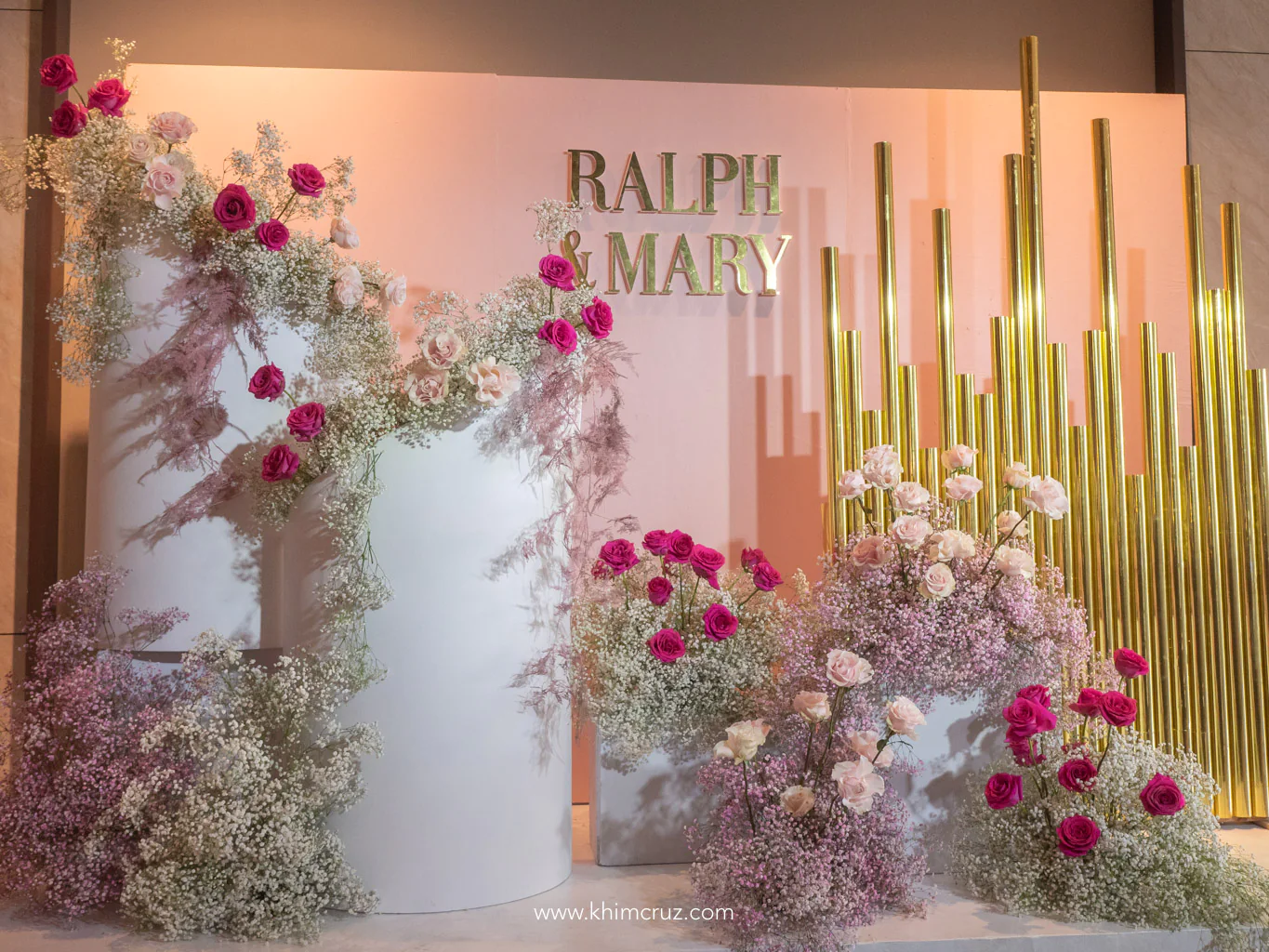 dreamy pink flowers arranged for the photo backdrop at the cocktail area by Khim Cruz