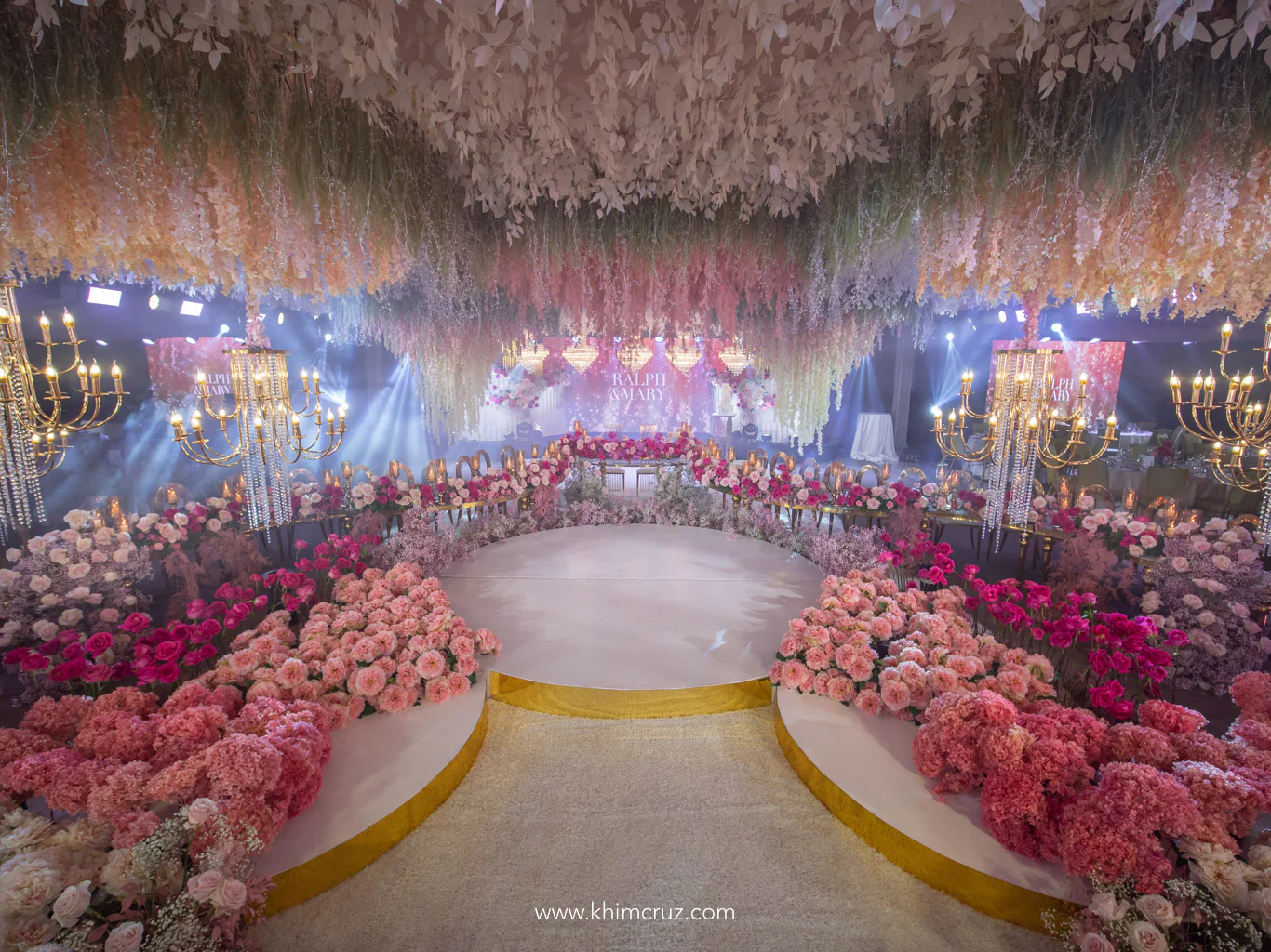 dreamy pink hues floral arrangement for the dance floor and head tables at the wedding reception of Ralph & Mary designed by Khim Cruz