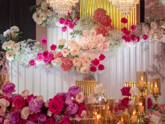 pink hues floral design for the wedding stage backdrop by florist Khim Cruz