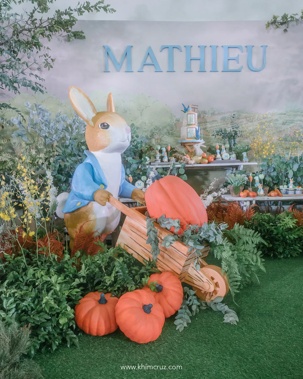 Peter Rabbit themed kids birthday party pumpkin on wheelbarrow
