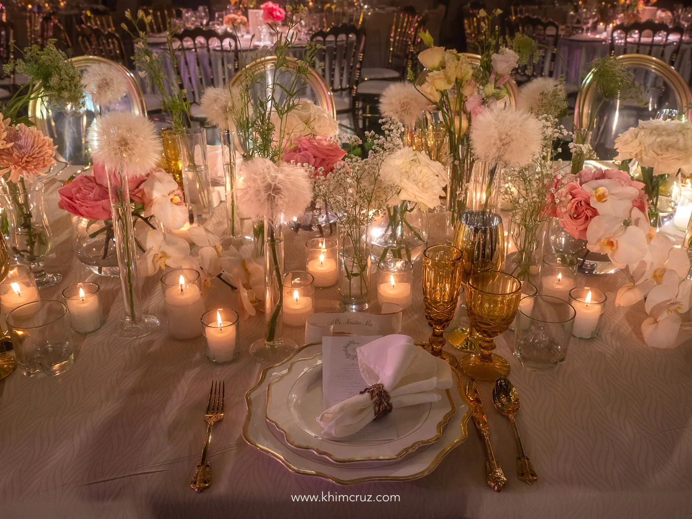 modern old-world floral table centerpieces with abundance of candles