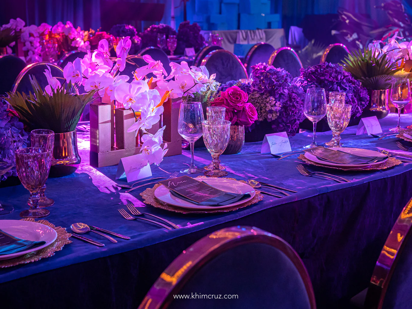 modern tropical themed corporate awards gala table setup floral setting
