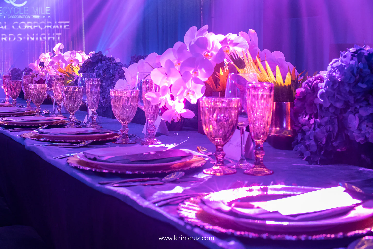 modern tropical themed corporate awards night flower table setup