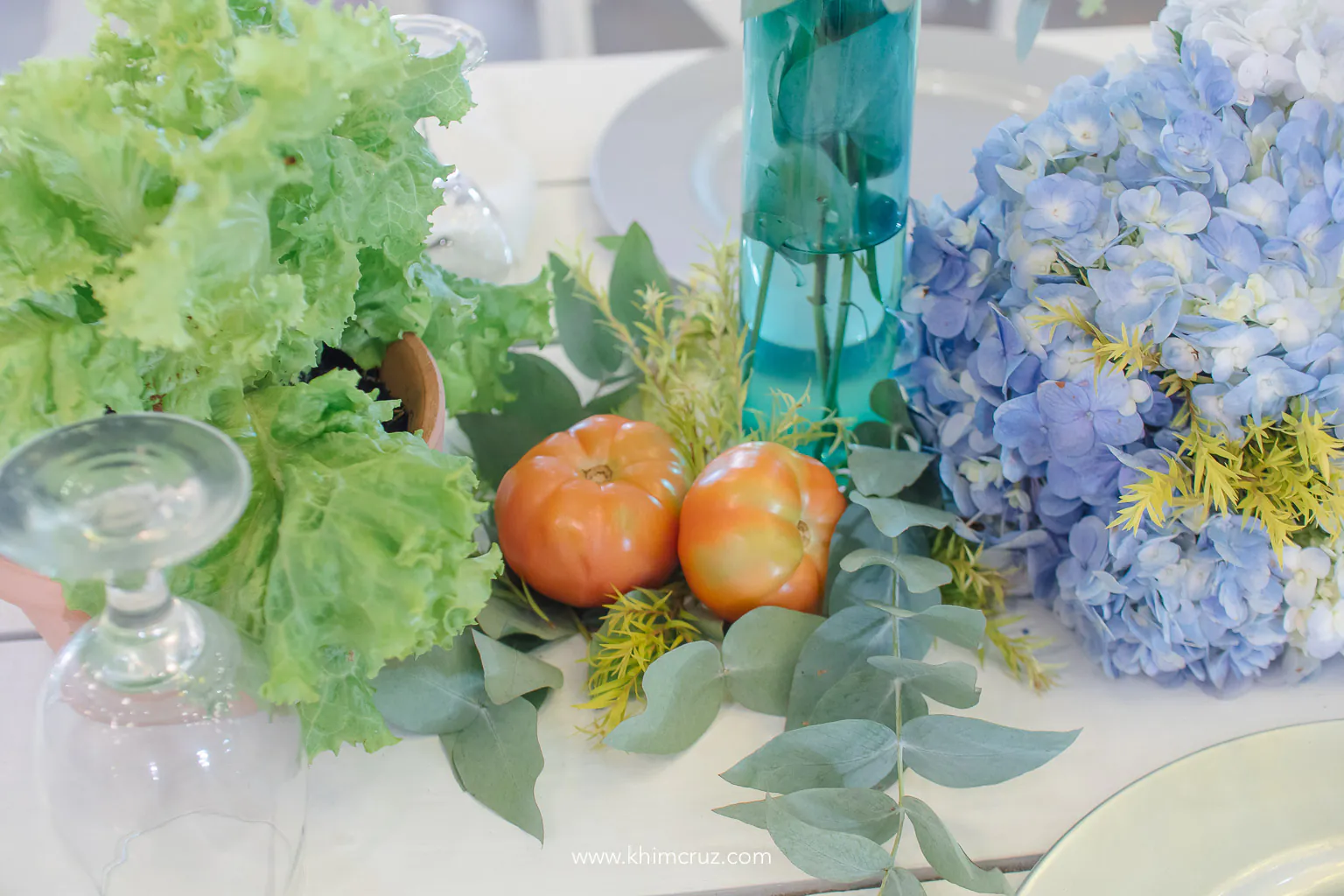 tomatoes and lettuce with floral accent table centerpiece for a Peter Rabbit themed birthday party