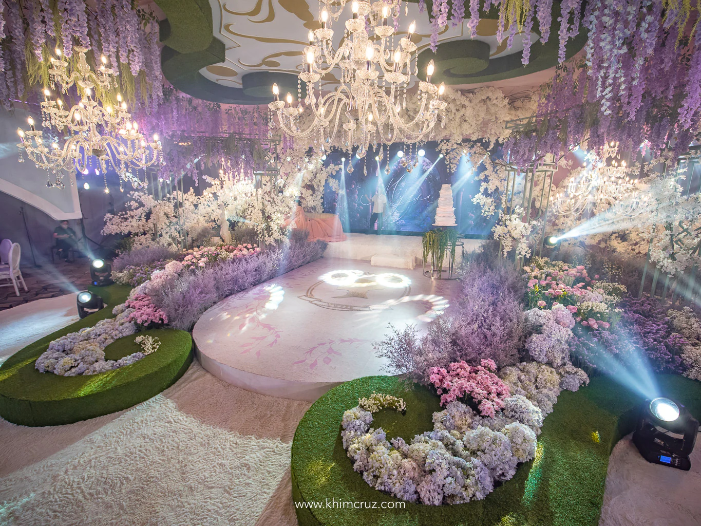 chateau gardens inspired debut party floral landscape with parterre design and chandeliers