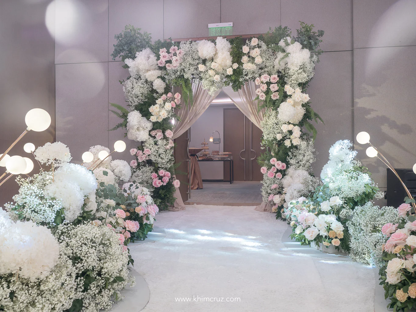 floral arch entrance for a garden-inspired intimate wedding reception