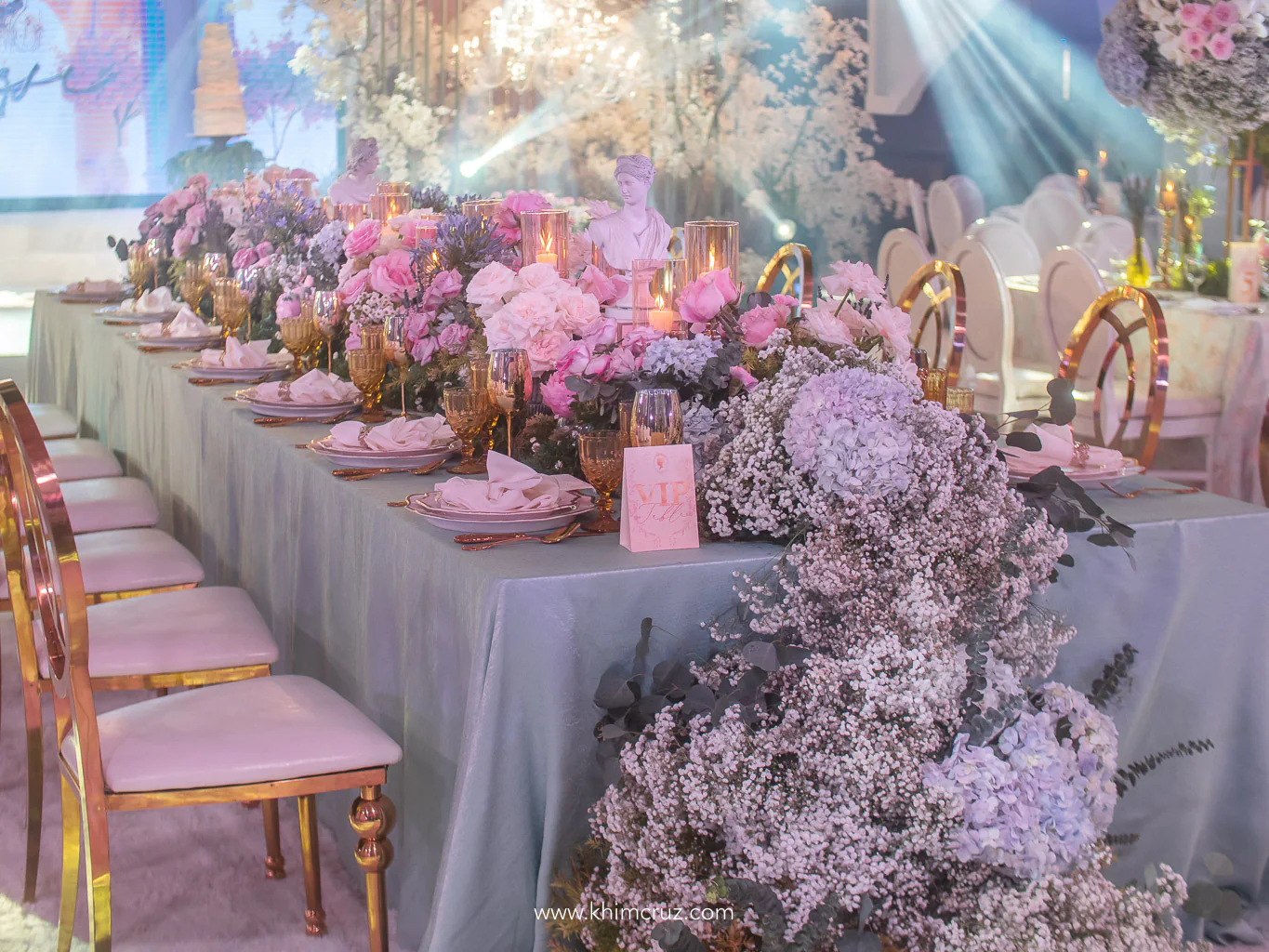 tablescape floral head table centerpieces with dainty-colored flowers for a debut by event stylist Khim Cruz