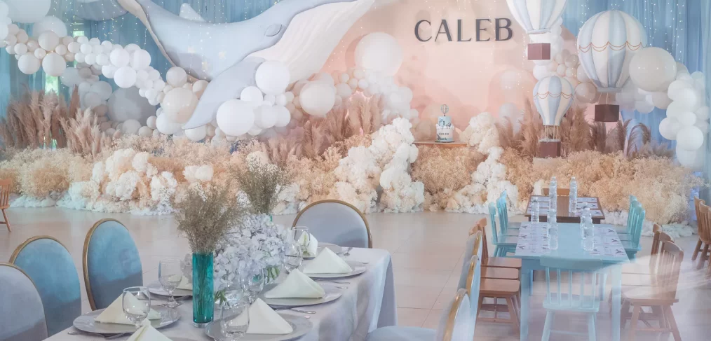 dreamy vintage celebration where whale glides amidst stars and clouds by event designer Khim Cruz