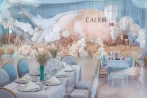 dreamy vintage celebration where whale glides amidst stars and clouds by event designer Khim Cruz