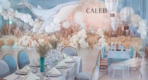 dreamy vintage celebration where whale glides amidst stars and clouds by event designer Khim Cruz