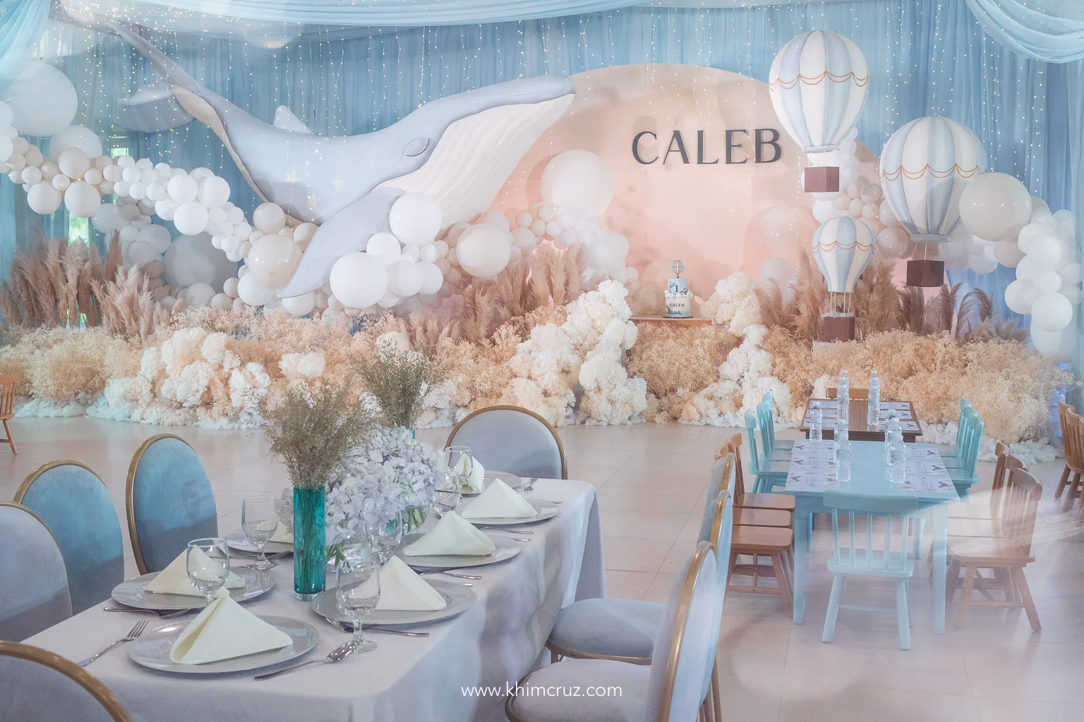 dreamy vintage celebration where whale glides amidst stars and clouds by event designer Khim Cruz