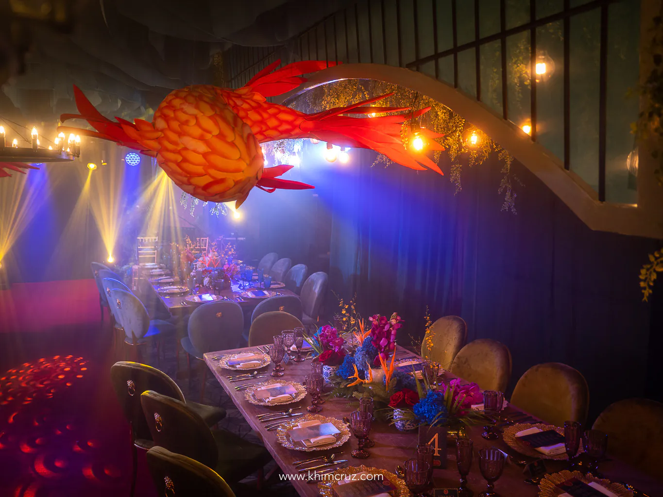 Koi fishes and arches on ceiling decor for this industrial Oriental celebration