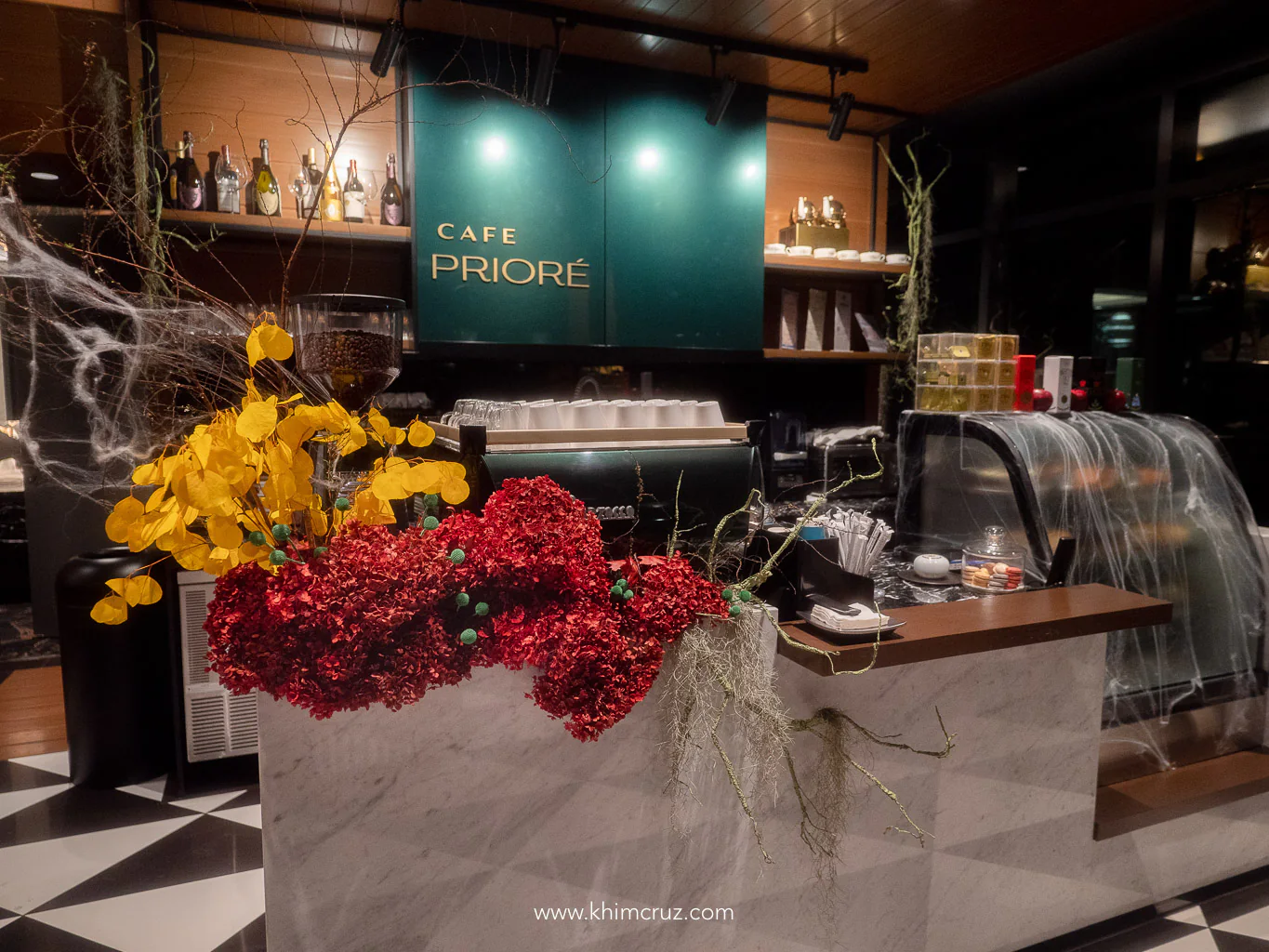 counter floral design for priore cafe for halloween event by Khim Cruz