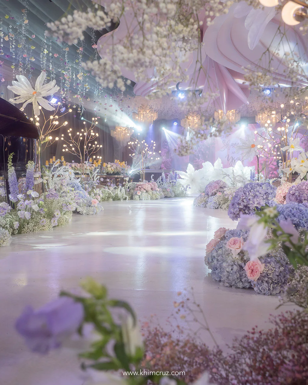 dreamy floral garden wedding reception aisle path floral design by wedding stylist Khim Cruz