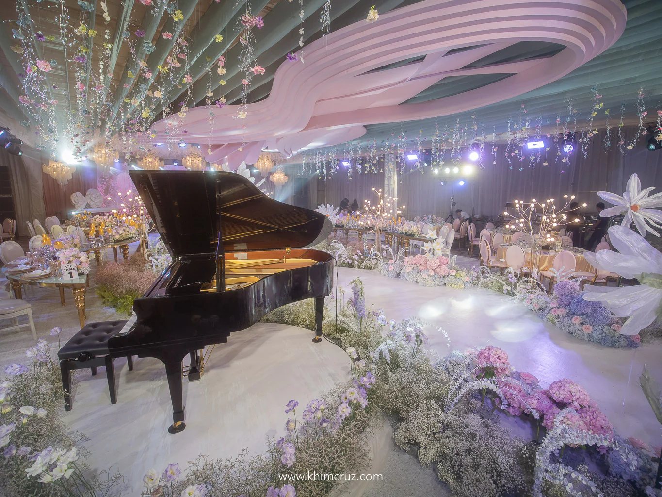 dreamy floral garden wedding reception with a grand piano