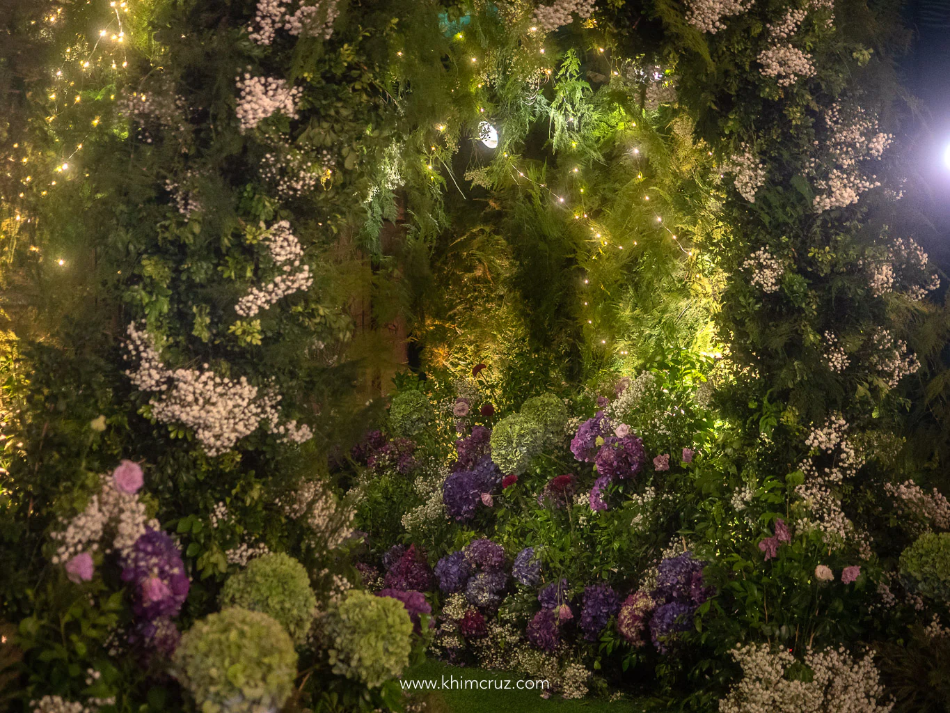 entrance tunnel passage way floral details to the enchanting forest of dreams debut