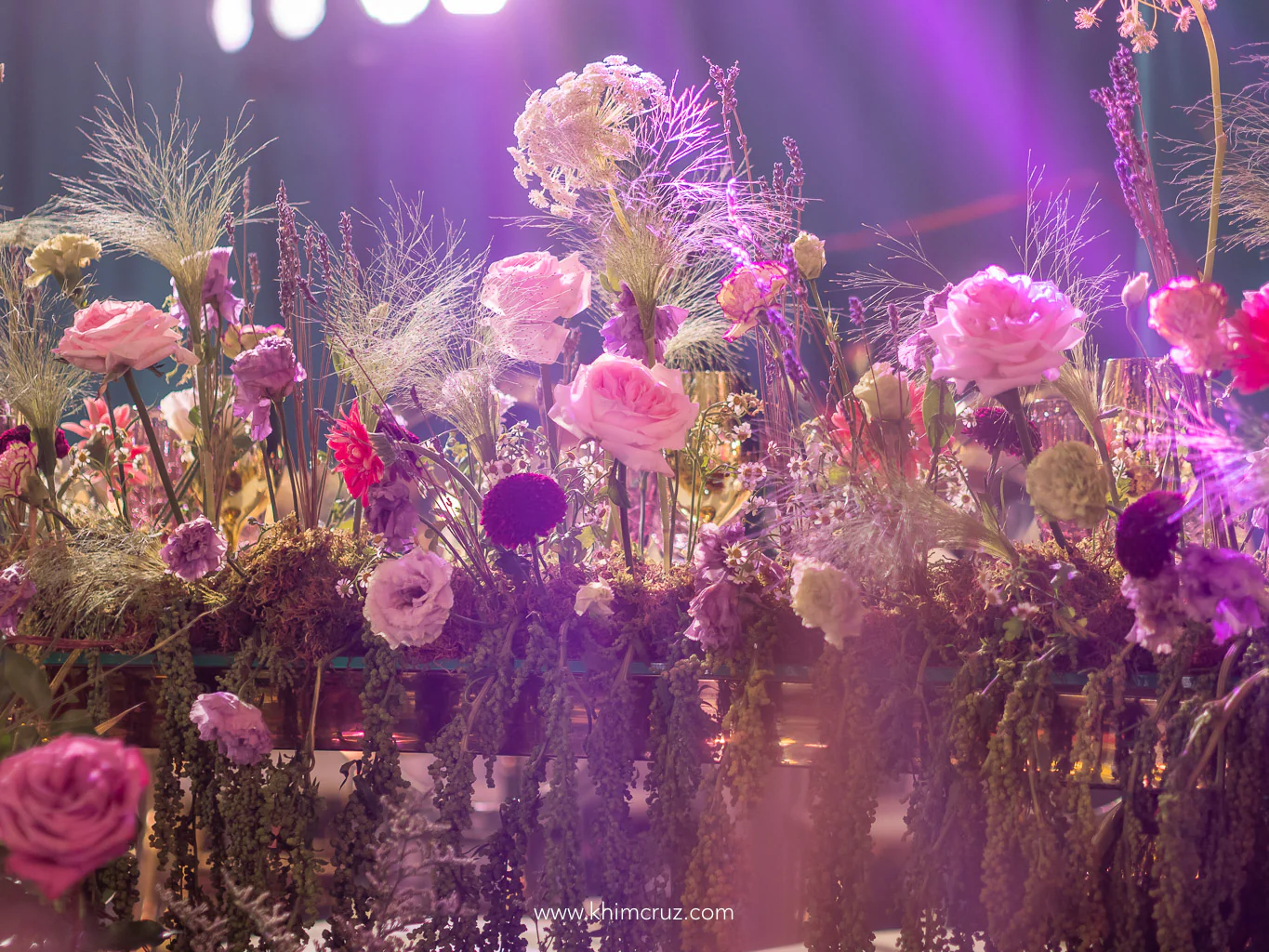 flowers as part of table design on an enchanted forest of dreams debut