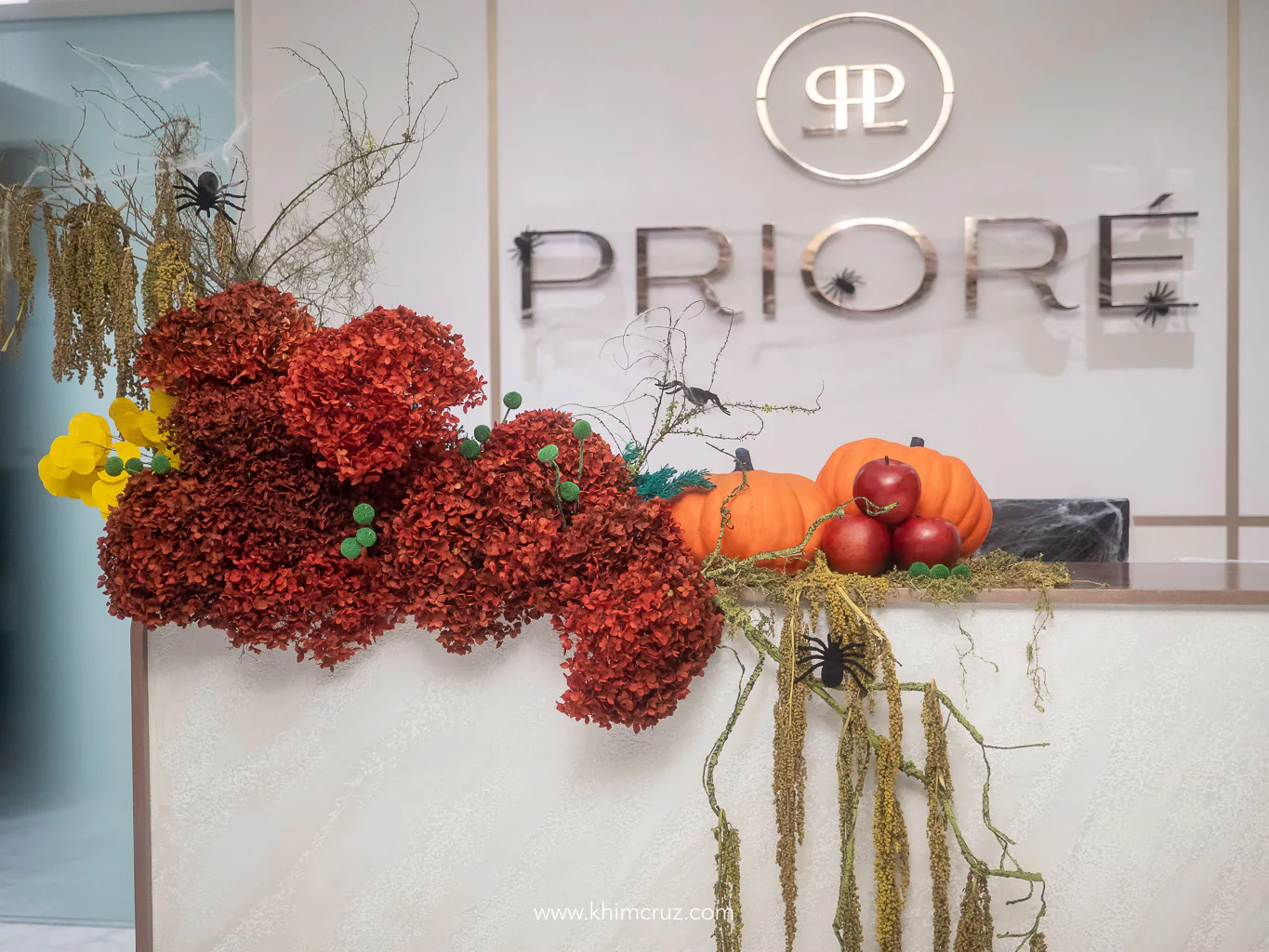 reception floral design for priore halloween event