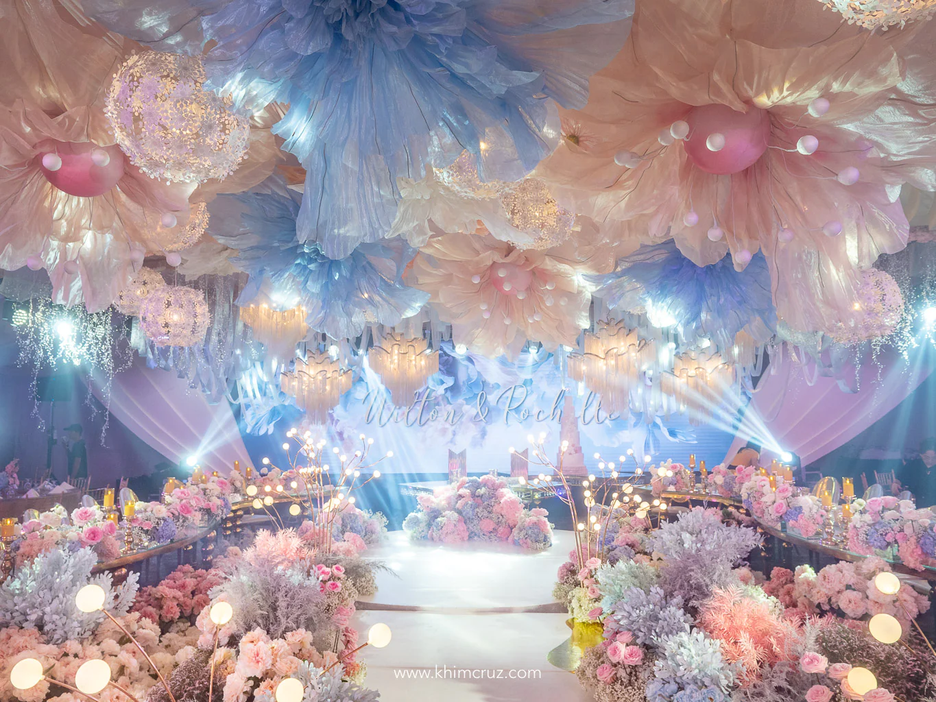 dreamy floral escape wedding with oversized hanging floral designs by Khim Cruz