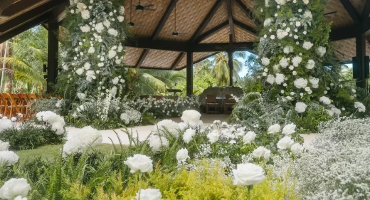 a pair of pillar florals stand as entrance of the wedding ceremony of Matthew and Monica's destination wedding design by Khim Cruz