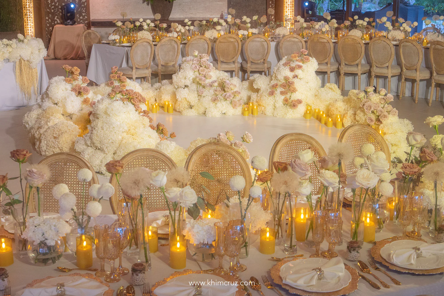 candle lit elegant wedding reception with white flowers