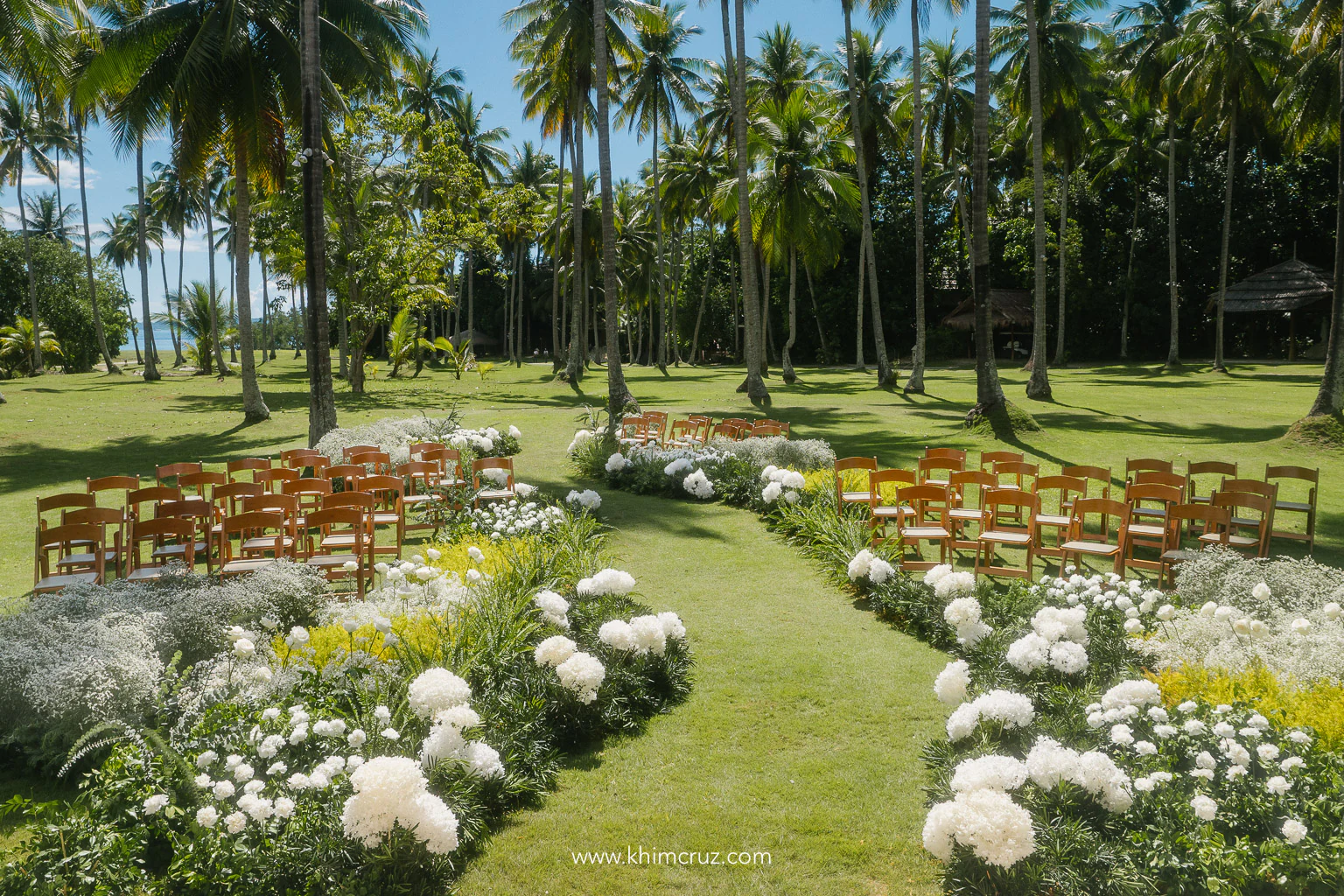 immersed in the ethereal beauty of a wildflower-covered meadow by Khim Cruz