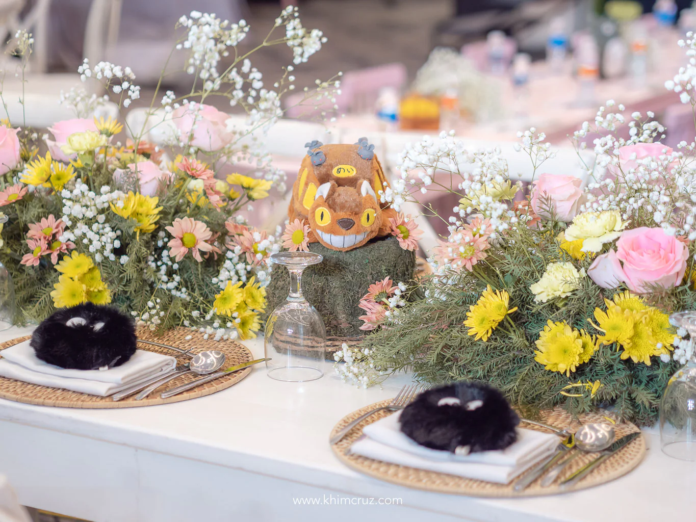 Floral table centerpiece with Catbus and Totoro Sprite table details