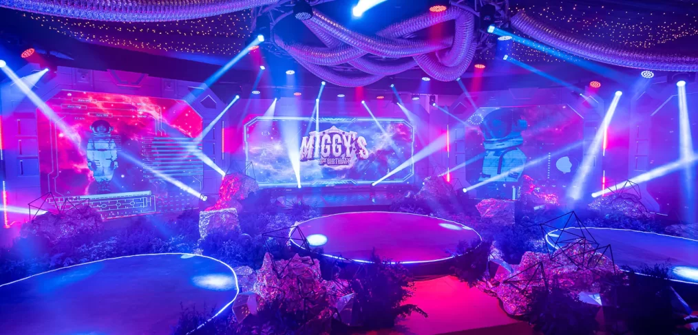 Immersive 180-degree panoramic spacecraft console stage backdrop for a space-themed birthday party