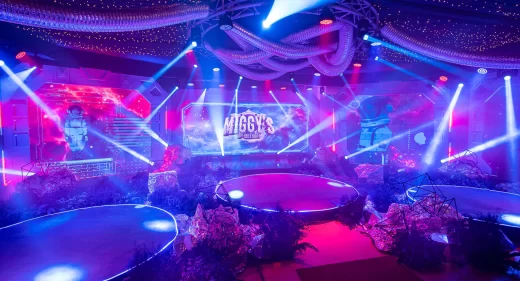 Immersive 180-degree panoramic spacecraft console stage backdrop for a space-themed birthday party