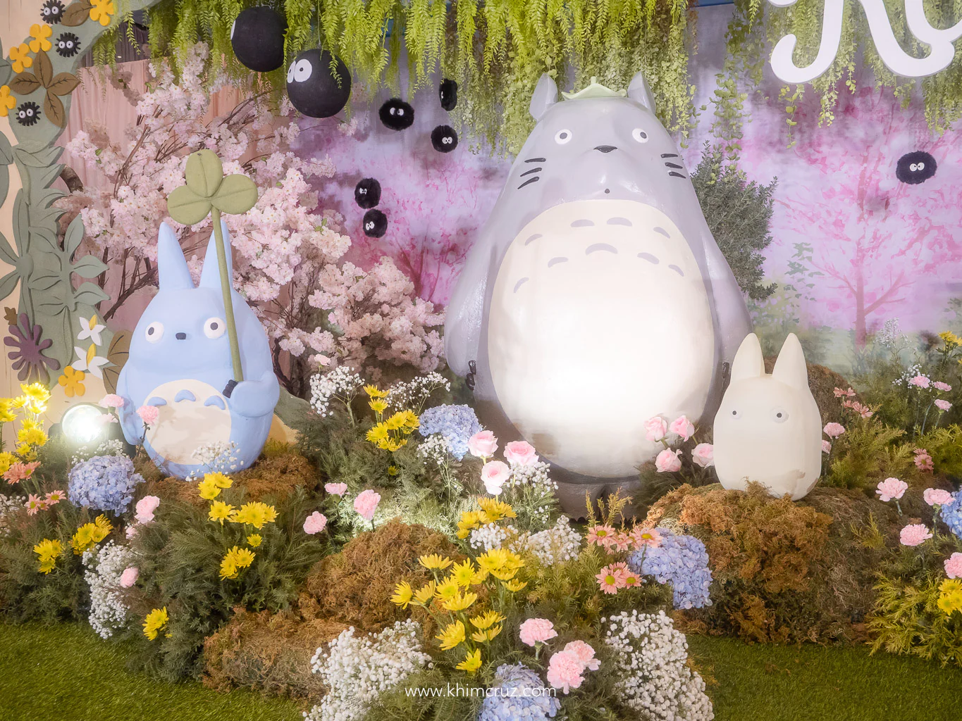Totoro 3D character pastel color palette on a forest setting stage diorama