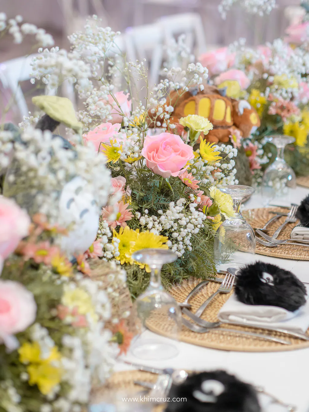 floral centerpieces in pastel colors with Totoro Sprite table details