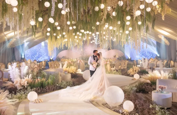 an earthy seaside theme wedding reception featuring shoreline inspired walkway