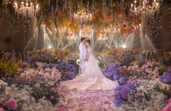 flower-filled reception adorned with pastel blooms in this garden dream theme wedding