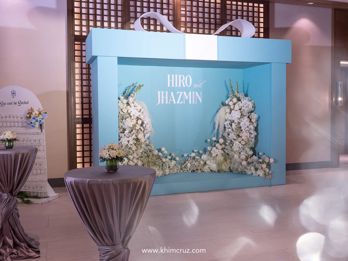 Tiffany-inspired box with white ribbon as photo backdrop