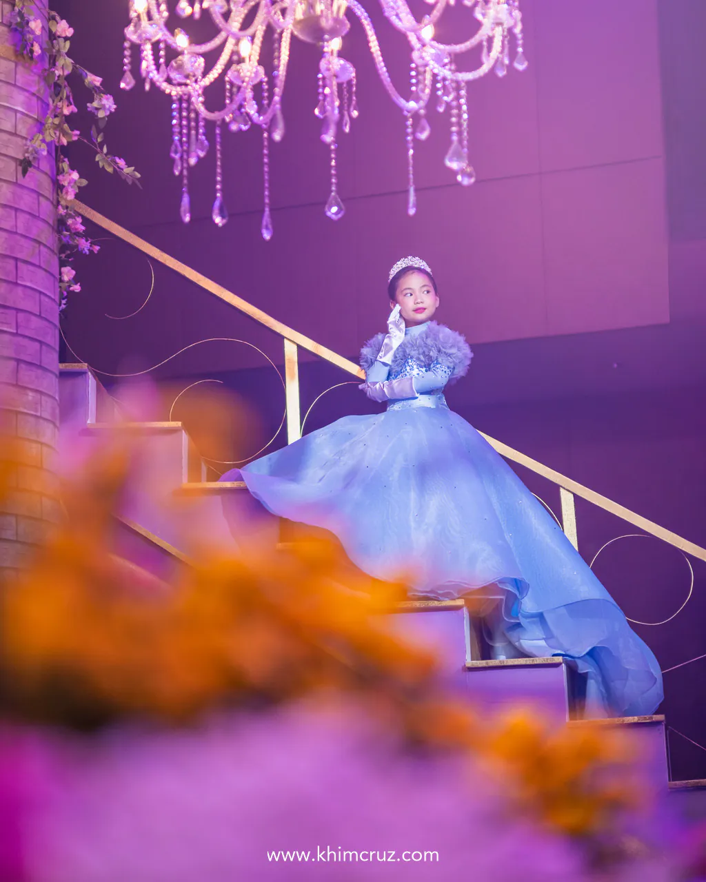 celebrant on a usable staircase to the princess castle backdrop
