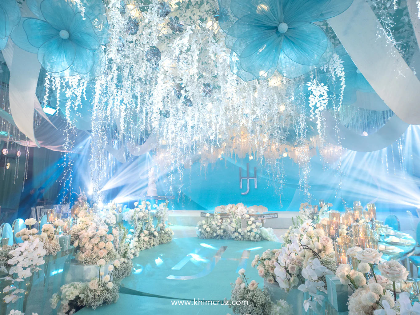 large hanging florals white ribbons and crystals on ceiling and white florals on the dance floor Tiffany-inspired wedding