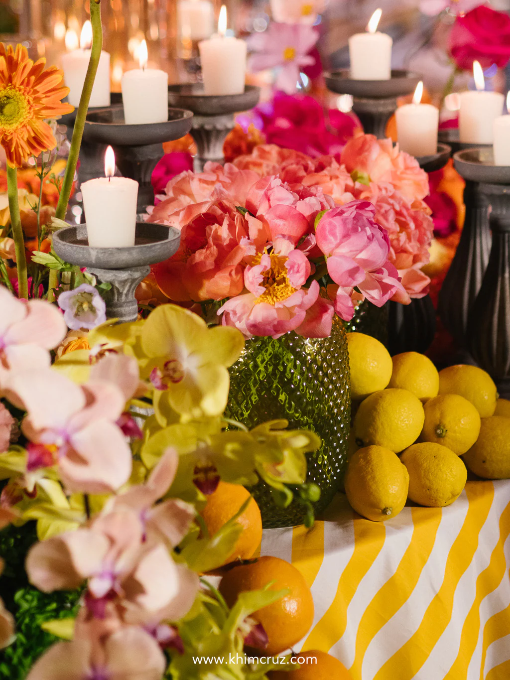 Citrus accents and colorful florals turned this wedding reception into a joyful escape