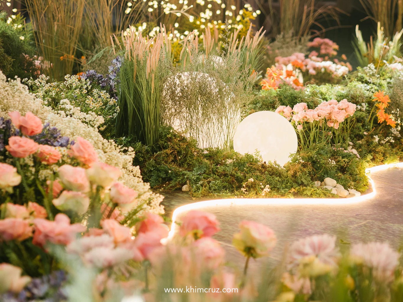 Glowing threads and flowers filled this “Willow”-inspired wedding reception