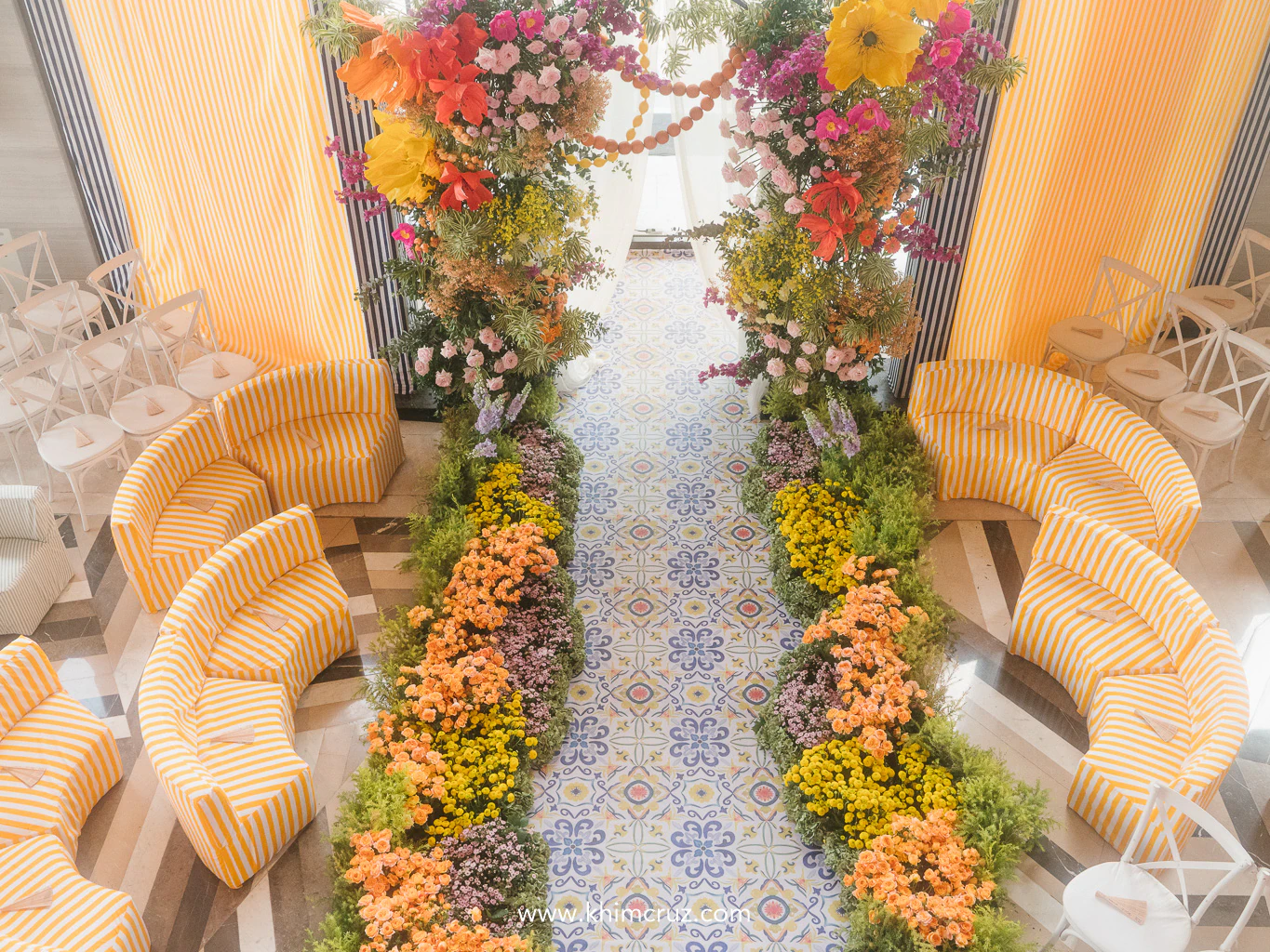 TJ & Ruth’s wedding ceremony brought Lake Como to life, with custom stripes, citrusy charm, and floral drama