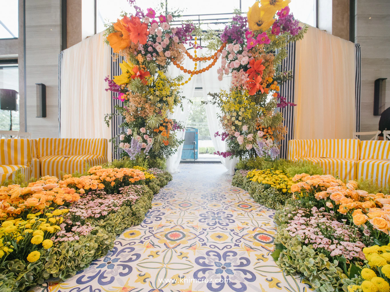 TJ & Ruth’s wedding ceremony was a fresh twist on Italian charm, complete with fruity pops and striped details