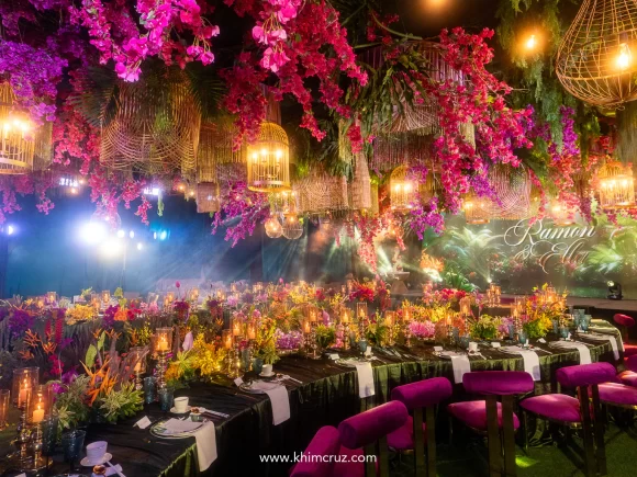 Bold blooms and golden glow set the stage for this stunning wedding reception