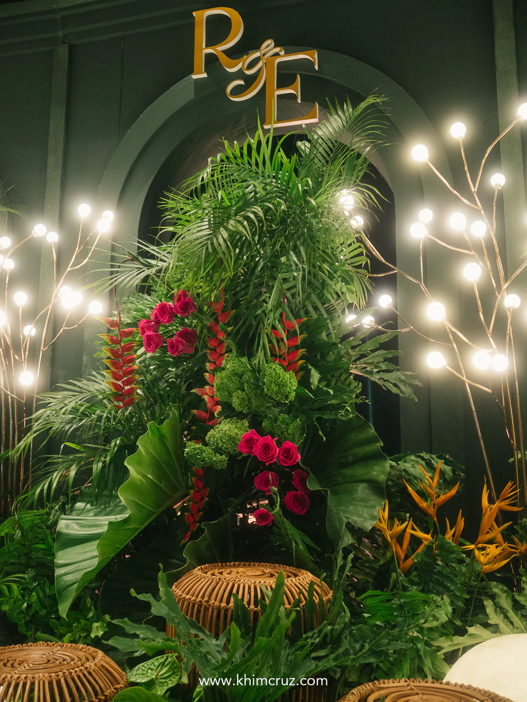 glowing lights and floral details on the modern tropical luxe photo backdrop
