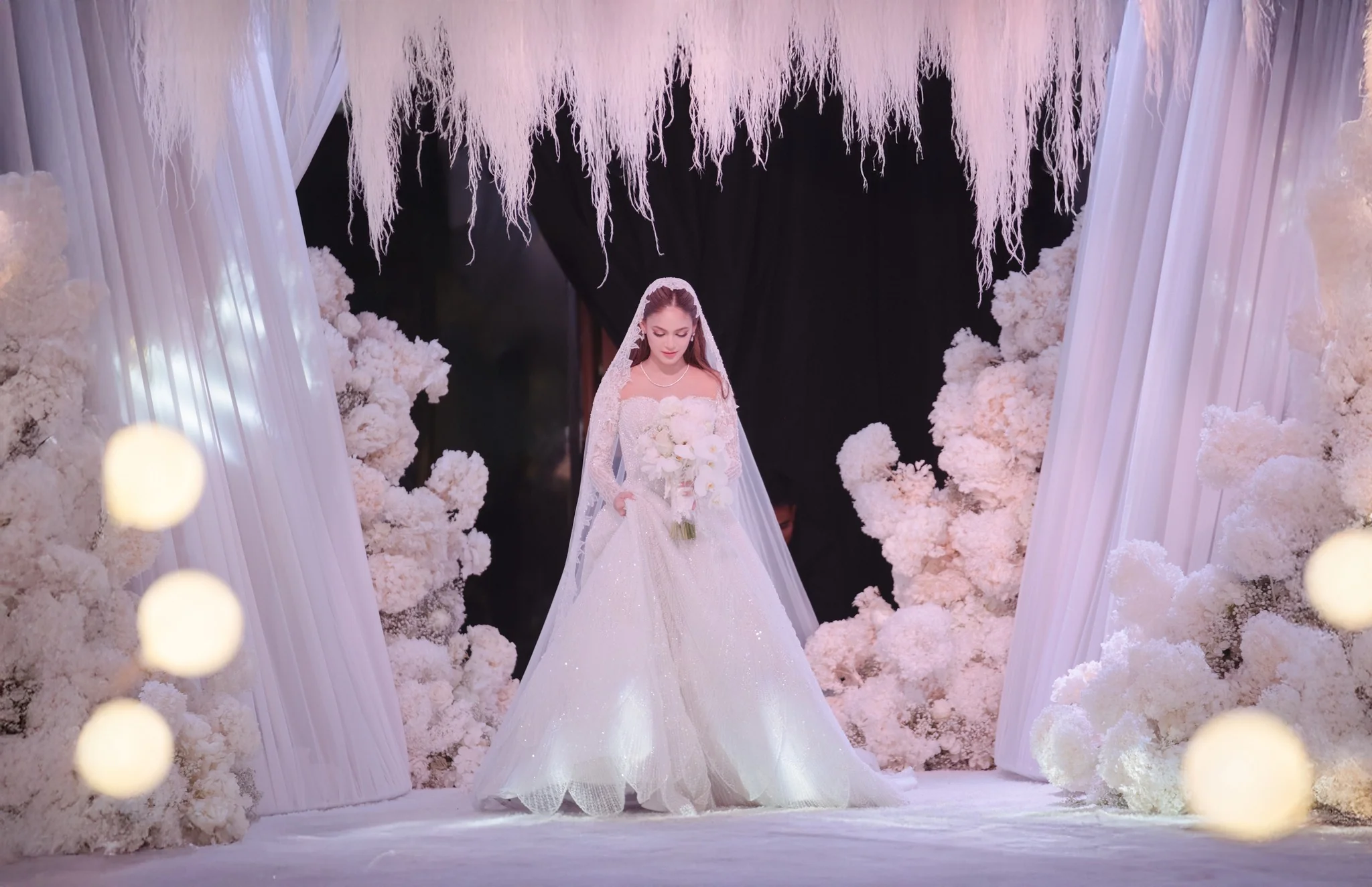 bride-white-floral-tunnel-entrance-feather-ceiling-wedding-davao-khim-cruz