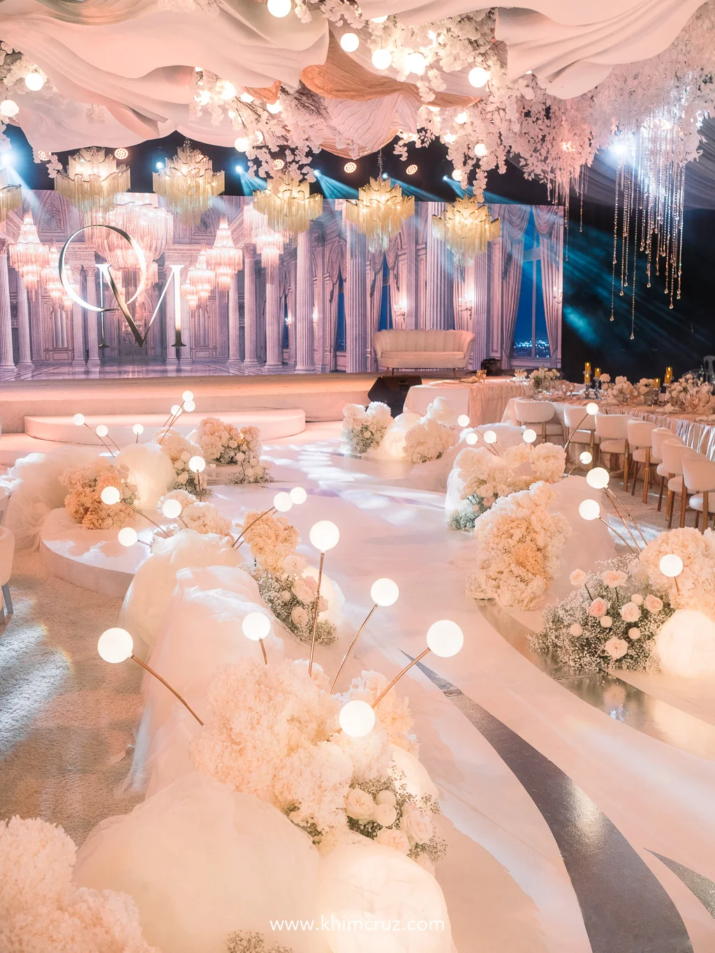 cloud-dancer-ethereal-white-floral-aisle-globe-lights-wedding-reception