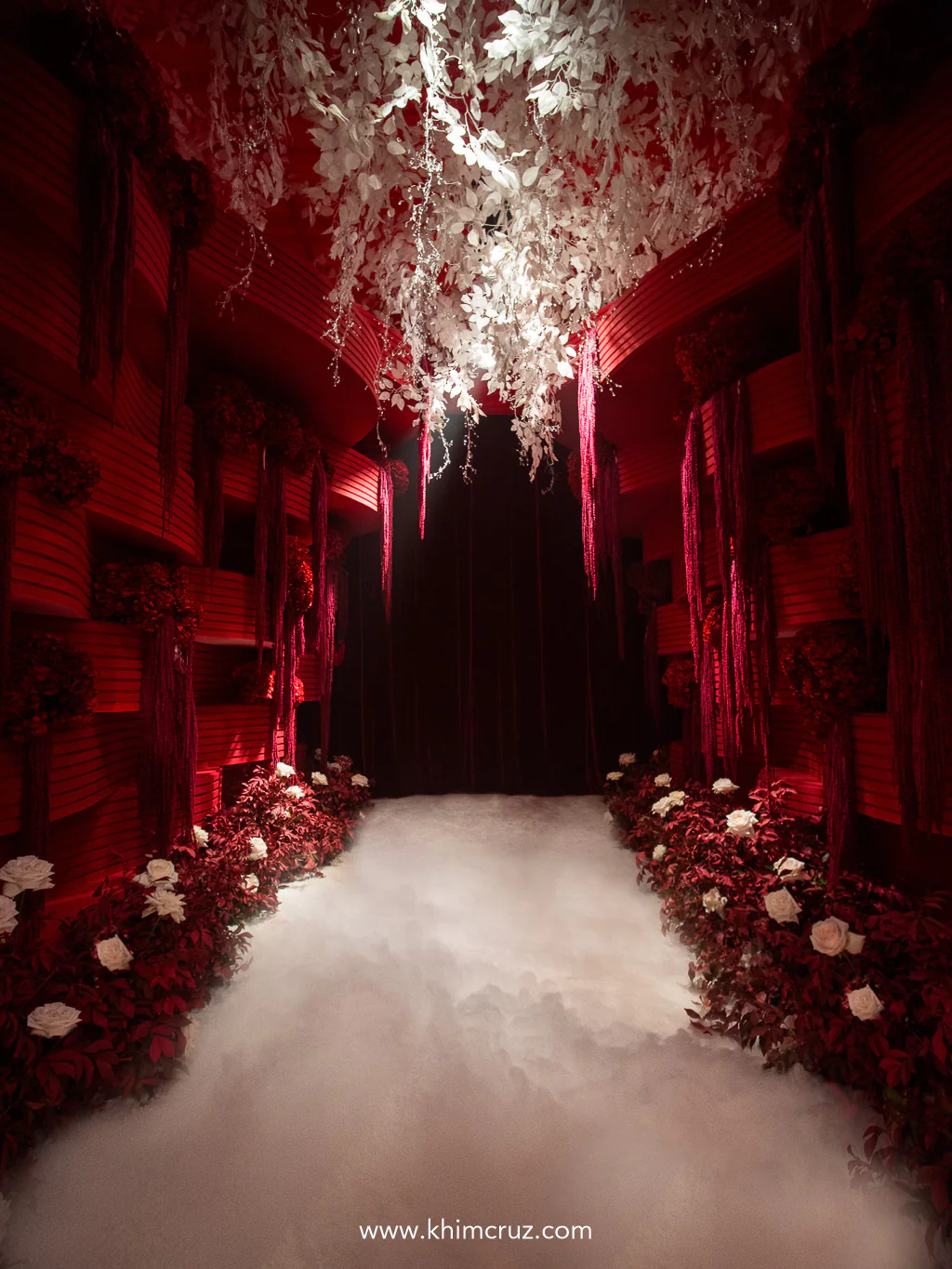 khim-cruz-davao-wedding-tunnel-foggy-red-floral-suspended-white-ceiling-installation
