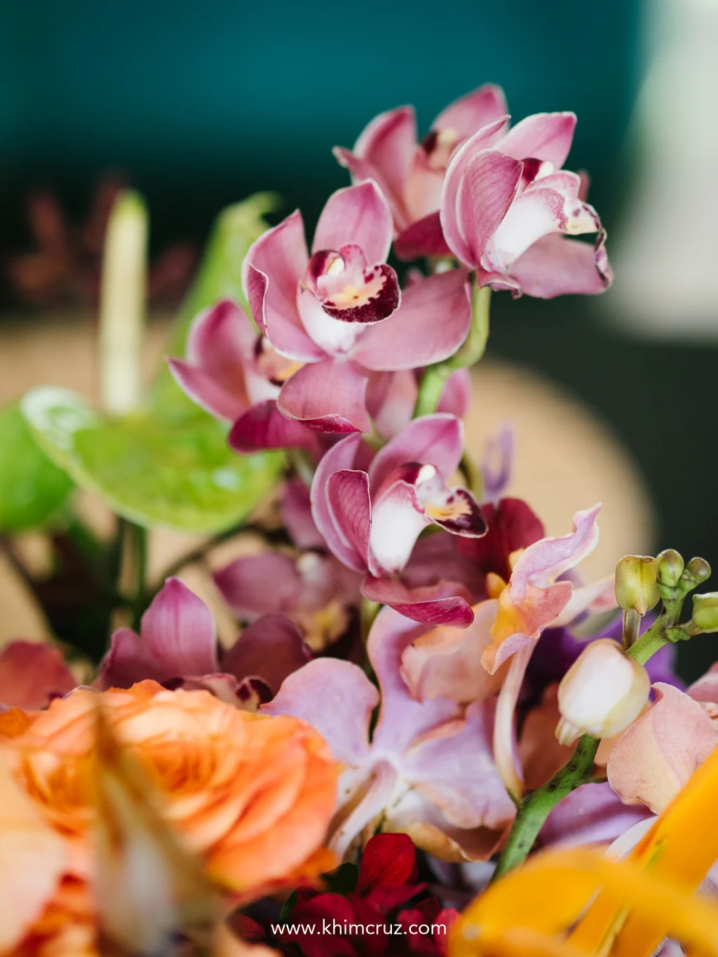 pink-cymbidium-orchid-orange-rose-tropical-centerpiece-khim-cruz-davao